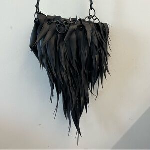 Feather Bag made of Rubber Tires